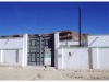 06 - New gate and perimeter wall surrounding courtyard, Asnab, 2008